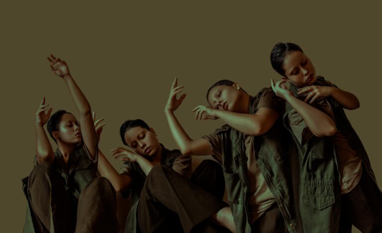 Group of female dancers with closed eyes in similar clothes gracefully gesticulating with hands near wall in studio during performance